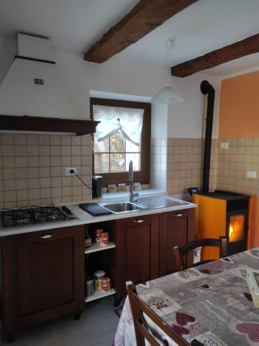 CASA DEL CIOS calda e intima casetta immersa nel verde delle montagne Alpe Basciumo Esterno foto